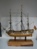A wooden model of San Jaun Netomuceno three masted sailing ship on stand