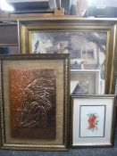 A framed copper relief panel depicting a Native American chief,