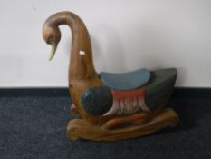 A hardwood rocking toy of a swan CONDITION REPORT: Restorations to neck.