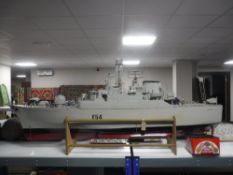 A remote controlled model boat - HMS Amazon on wooden stand (no hand set) CONDITION