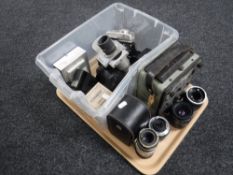 A tray containing Universal Avo meter, assorted camera lenses, digital cameras,
