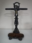 A cast iron stick stand