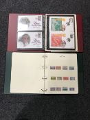 An album of U.S.A. stamps, together with an album of first day covers, coin covers, etc.