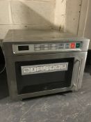 A stainless steel commercial microwave