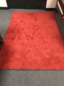 A contemporary red woollen Tuareg Indian rug