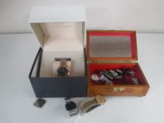A carved Eastern trinket box containing gents wrist watches including Citron etc, a silver ring,