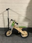 A Sesame Street balance bike and a micro scooter