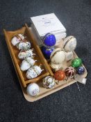 A tray of decorative china and metal eggs, three Bradex jewelled eggs.