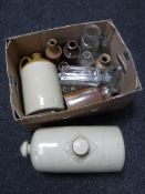 A box of antique glass and stoneware bottles