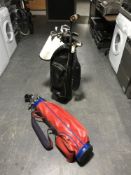 Two golf bags containing various golfing irons and drivers - Dunlop etc