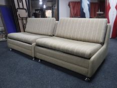 A pair of mid 20th century 3' bed settees