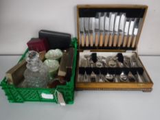 An oak canteen of cutlery together with a basket of cutlery, Carnival glass vases,