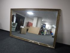 A large gilt framed over mantel mirror,