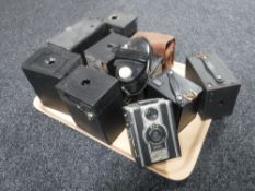 A box of ten vintage cameras including a portrait Hawkeye,
