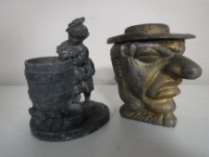 A gilded metal Mr Punch lidded jar together with a metal figure - Girl at well.