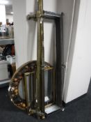A brass rail, a brass curtain rail, chrome fender,