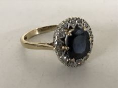 A 9ct gold sapphire diamond cluster ring, size O.