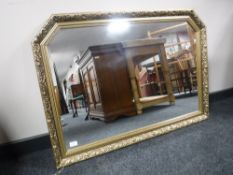 A gilt-framed overmantel mirror, 74 cm x 104 cm.