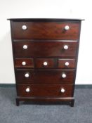 A Stag Minstrel seven drawer chest