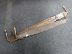 Two vintage cross cut saws