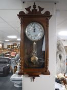 An Acctim Westminster chiming wall clock