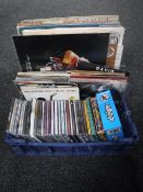 A crate of vinyl 7 inch and 12 inch singles and LP's - picture discs,
