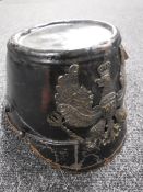 An antique leather policeman's hat