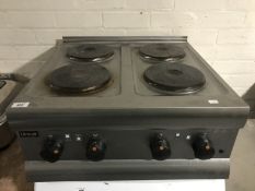A Lincat stainless steel bench top four ring electric cooker