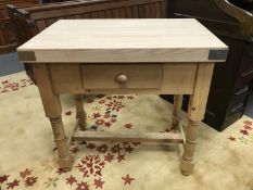 A reclaimed pine butcher's block fitted a drawer,