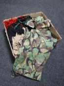 A box of military clothing and patches