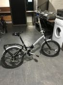 An Apollo Transition folding bike