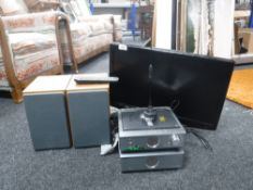 A 21 inch Digitrex LCD TV with remote together with a Hitachi micro hifi system