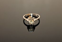 A white gold diamond solitaire ring, approximately 0.6ct, size N/O.