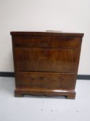 A late nineteenth century mahogany cabinet,