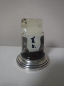 A silver desk calendar,