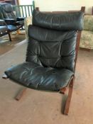 A late twentieth century Danish black leather armchair