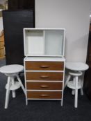 A painted teak four drawer chest,