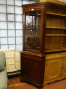 A mahogany corner display cabinet