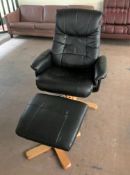 A black swivel relaxer armchair with stool