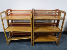 Four sets of folding book shelves