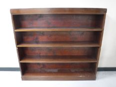 A set of twentieth century mahogany open bookshelves