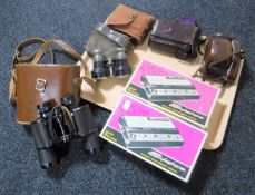 A tray of assorted cameras, two boxed stylophones,