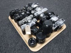A tray of twelve assorted vintage cameras - Zenit, Praktica,