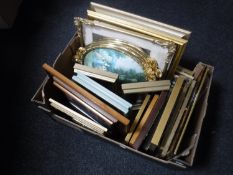 Two boxes of assorted pictures and prints plus a fringed Chinese rug