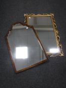 An antique mahogany arched topped mirror and an ornate gilt framed mirror