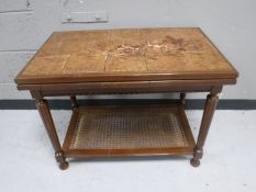 A late twentieth century mahogany tile topped pull out coffee table,