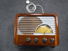 A mid 20th century mahogany cased valve radio,