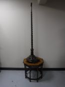 An octagonal oak barley twist occasional table,
