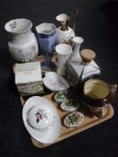A tray of Royal Doulton Johnny Appleseed character jug, trinket boxes, Buckingham Palace mug,