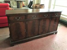 An inlaid mahogany Regency style sideboard